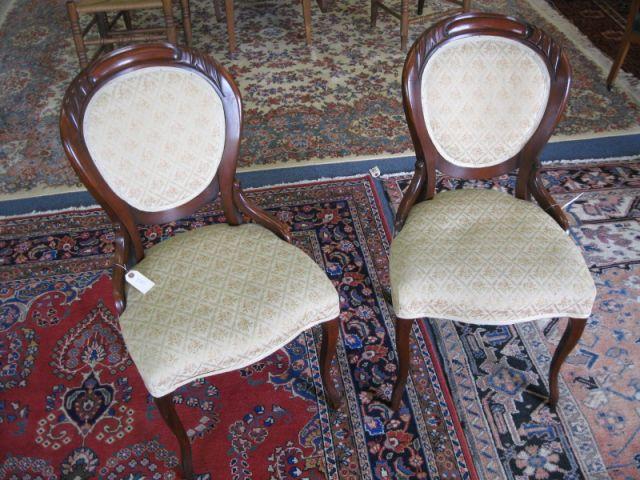 Appraisal: Pair of Victorian Mahogany Side Chairs balloon back floral brocade