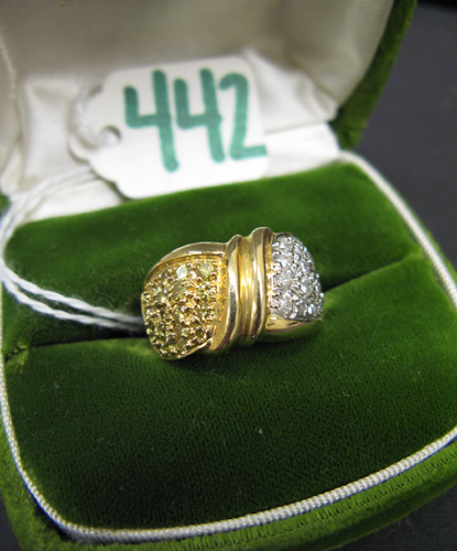 Appraisal: DIAMOND AND FOURTEEN KARAT GOLD RING set with round-cut white