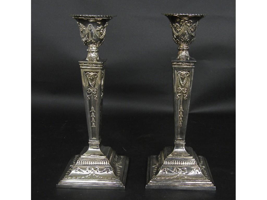 Appraisal: Pair of Adams style silver candlesticks the tapered baluster sconces