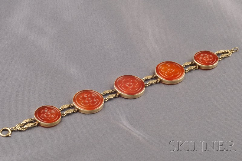 Appraisal: kt Gold and Carnelian Bracelet bezel-set with carved tablets depicting