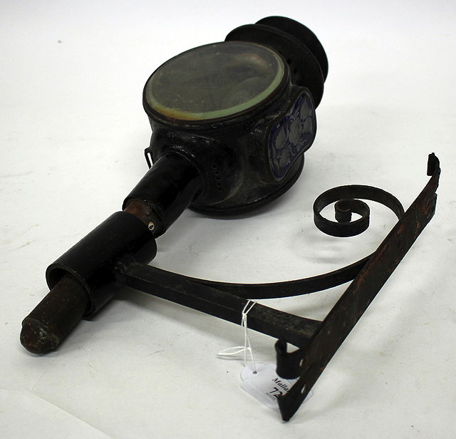 Appraisal: AN OLD BLACK PAINTED WROUGHT IRON CARRIAGE LAMP with double