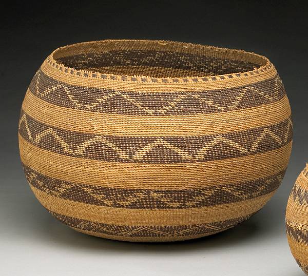 Appraisal: A Pomo basket A bamtush weave with four concentric design