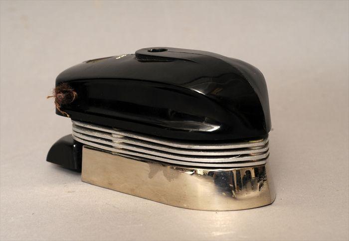 Appraisal: English Streamline Moderne 'Smoothie' Travel Iron x in