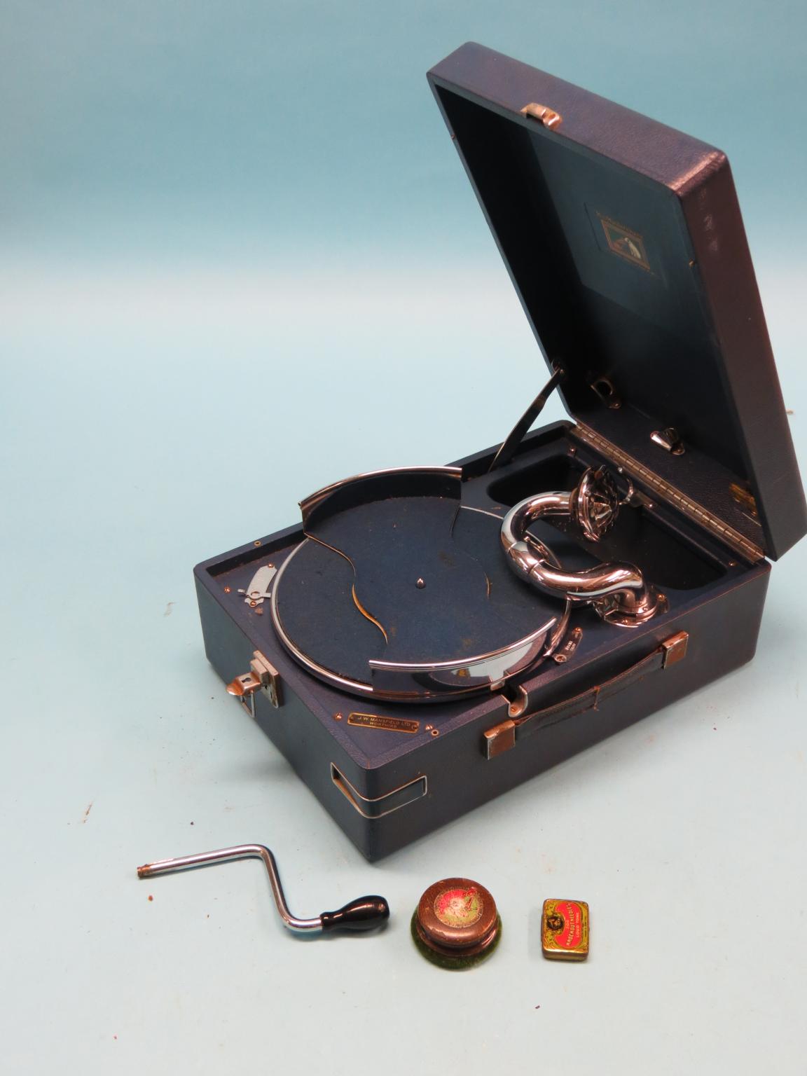 Appraisal: A blue HMV portable gramophone with winding crank and accessories