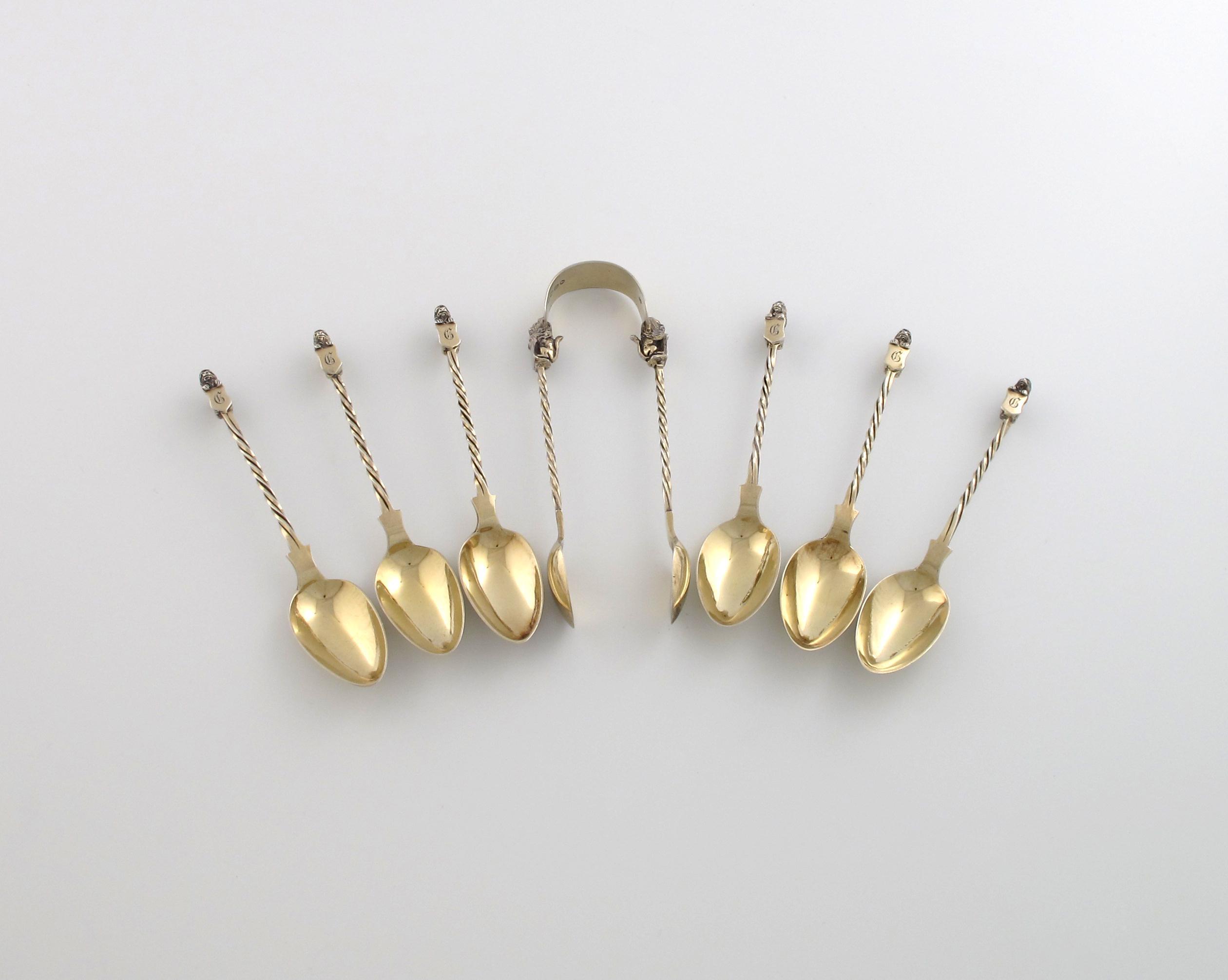 Appraisal: A set of six Victorian silver-gilt teaspoons and tongs