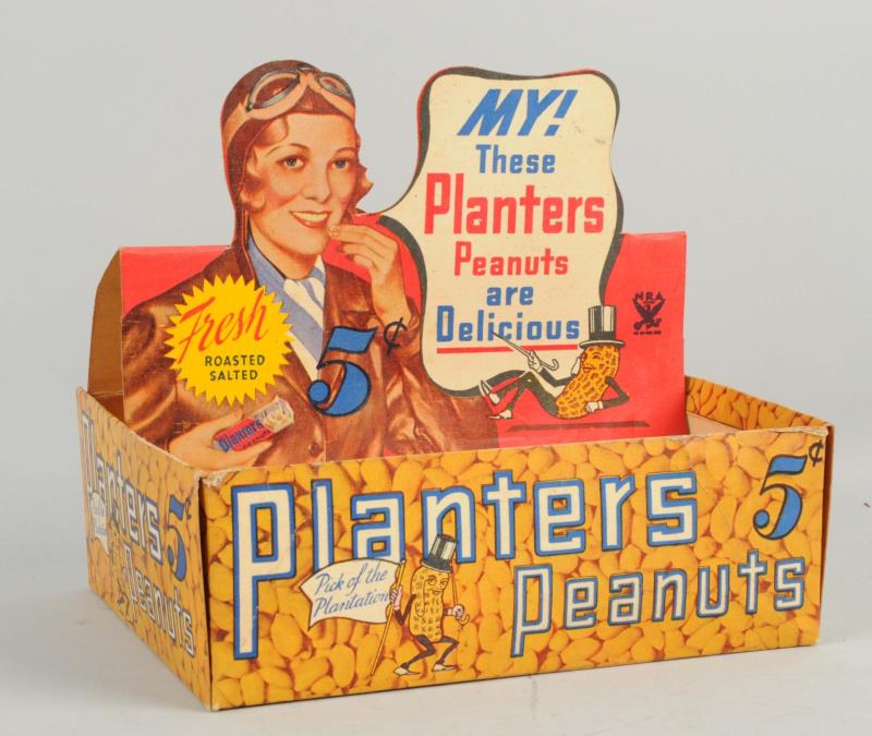 Appraisal: Planters Peanuts Box With Female Pilot This Planters box depicts