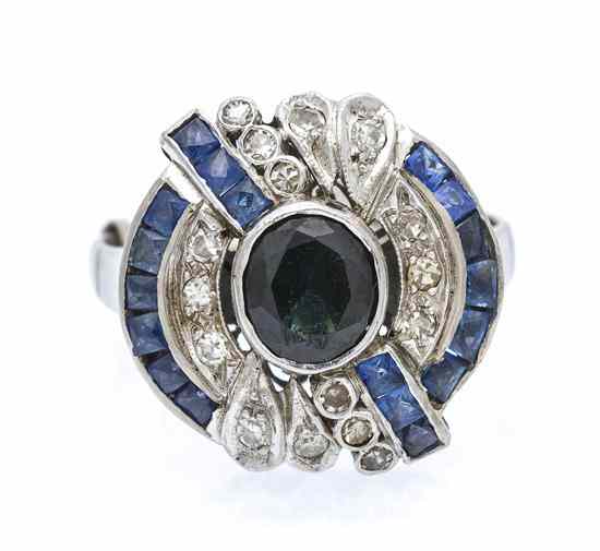 Appraisal: A White Gold Sapphire and Diamond Ring containing one oval