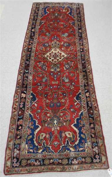 Appraisal: SEMI-ANTIQUE PERSIAN HALL CARPET Hamadan region northwest Iran floral and