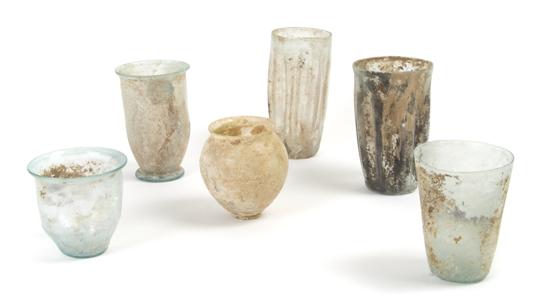 Appraisal: A Collection of Roman Glass Beakers and Cups Height of