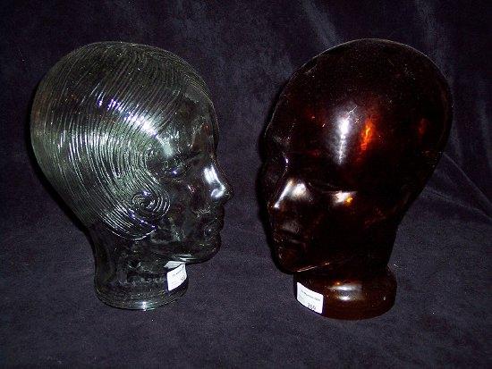 Appraisal: Two hatmaker's glass shop display heads one modelled with s