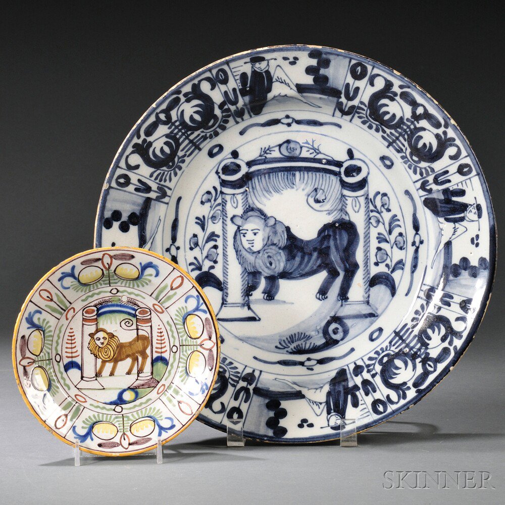 Appraisal: Two Dutch Delft Plates late th century a charger and