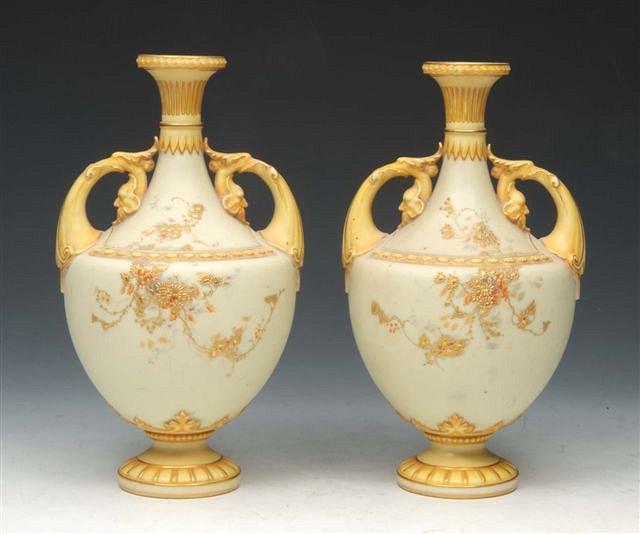 Appraisal: A PAIR OF ROYAL WORCESTER BLUSH IVORY AND YELLOW GROUND