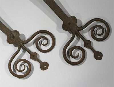 Appraisal: A pair of Gothic Revival large door hinges each with