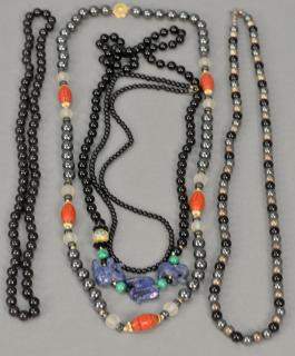 Appraisal: Five necklaces including black onyx cinnabar and silver Five necklaces