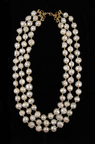 Appraisal: PRINCESS LENGTH TRIPLE-STRAND PEARL NECKLACE measuring inches in length and