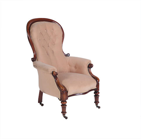 Appraisal: A Victorian mahogany framed armchair The button back and upholstered