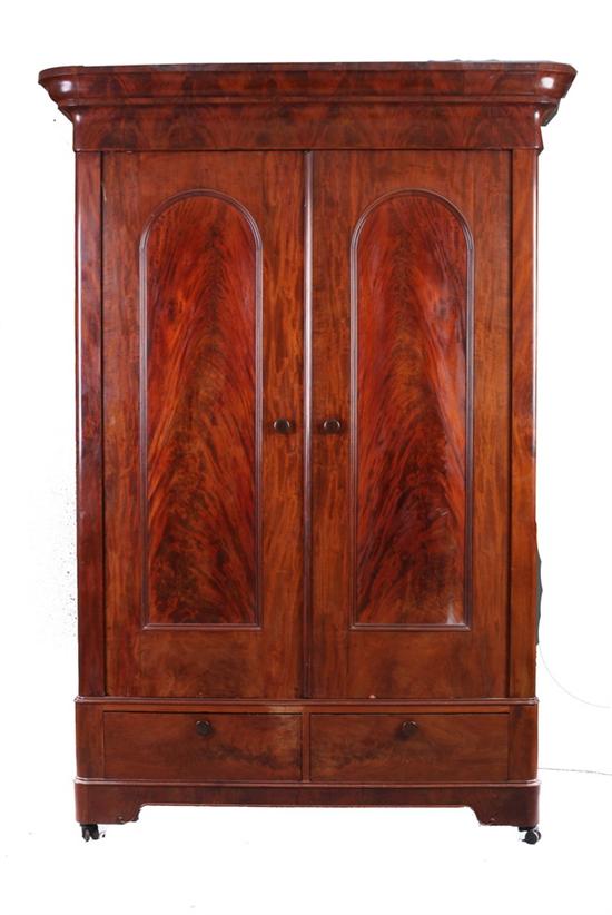 Appraisal: EMPIRE MAHOGANY ARMOIRE th century Monumental scale with projecting molded