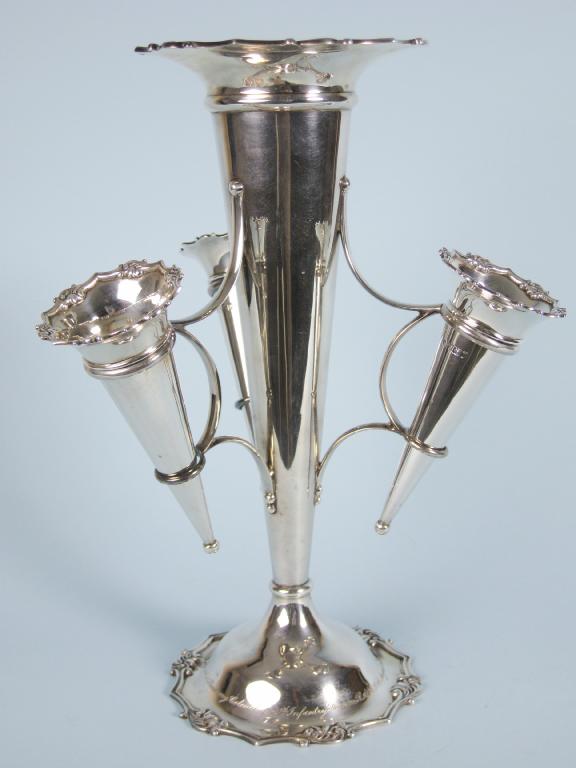 Appraisal: A George V Epergne with central trumpet and three further