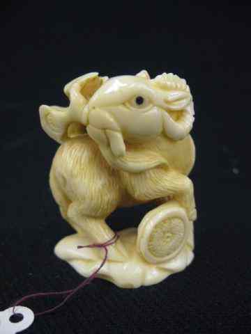 Appraisal: Carved Hippo Ivory Netsuke of a Ram with a lucky