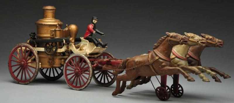 Appraisal: Cast Iron Dent Fire Pumper Horse-Drawn Toy Description American Oversized