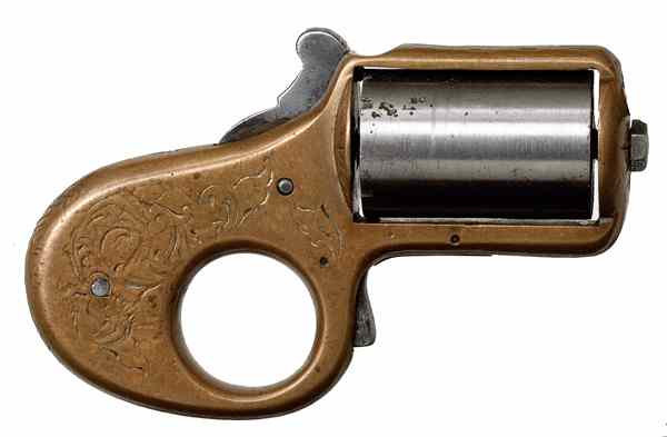 Appraisal: Knuckle Duster Revolver cal rimfire S N Engraved brass frame