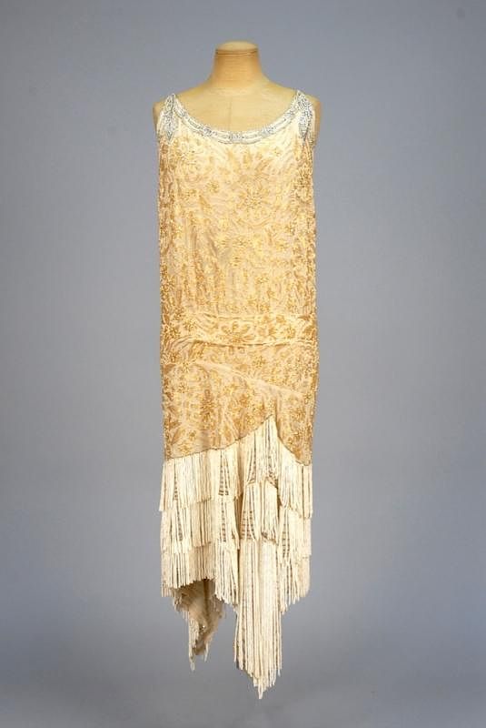 Appraisal: BEADED and FRINGED FLAPPER DRESS s Cream silk having allover