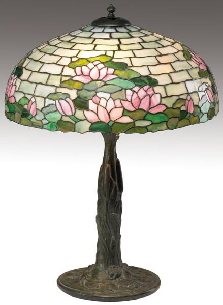 Appraisal: DUFFNER AND KIMBERLY Table lamp its leaded shade in a