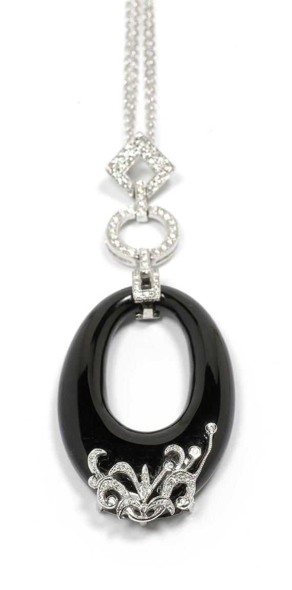 Appraisal: DIAMOND AND ONYX PENDANT WITH CHAIN White gold Attractive pendant