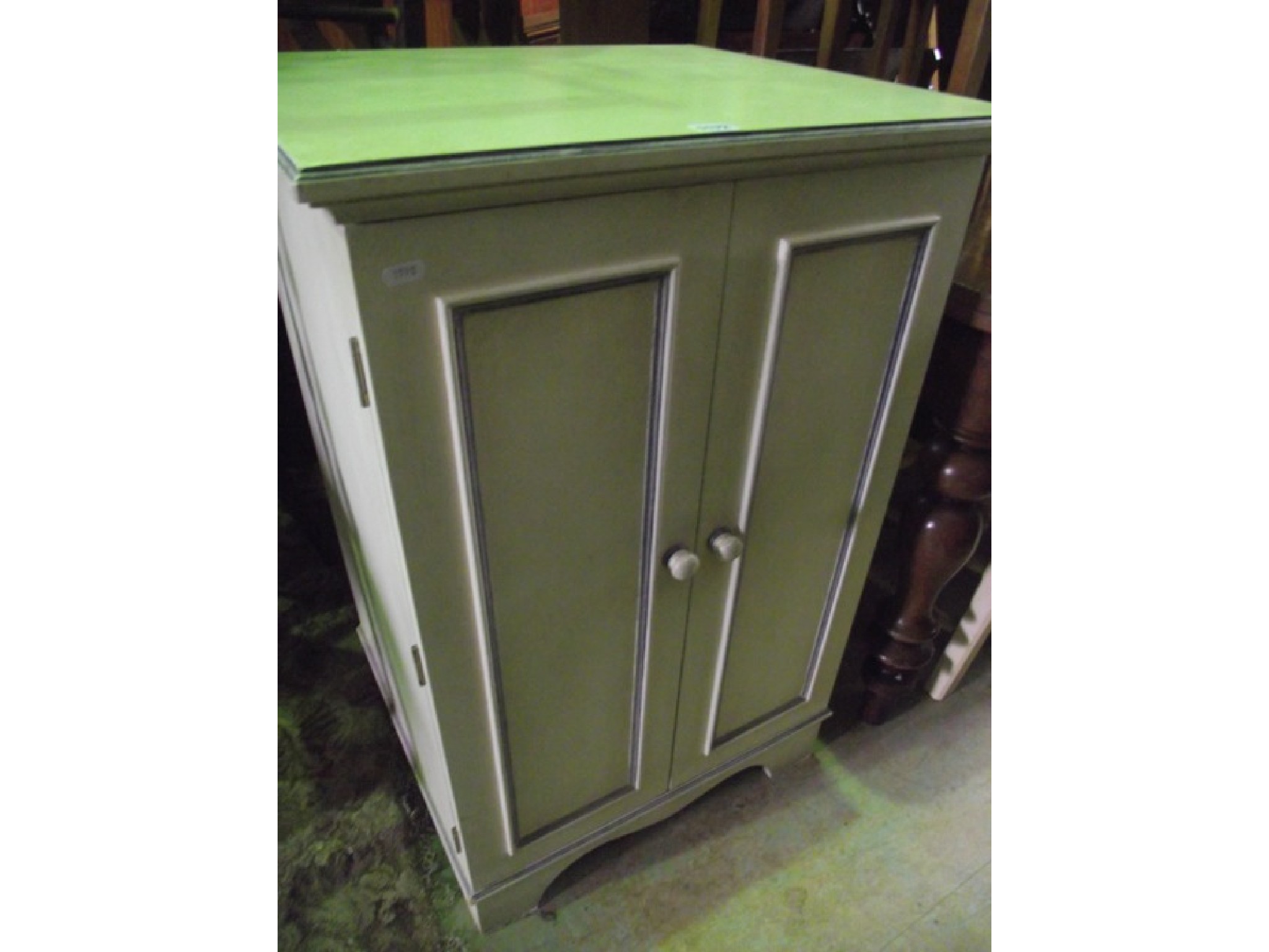 Appraisal: A painted pedestal side cabinet of square cut form enclosed