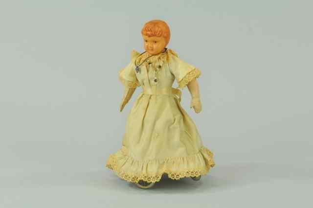 Appraisal: LEHMANN WALTZIING DOLL TOY Germany c early 's features celluloid