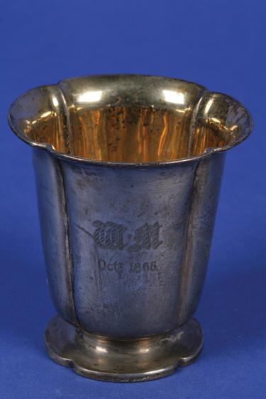 Appraisal: A GEORGE IV BEAKER of lobed form with a gilt