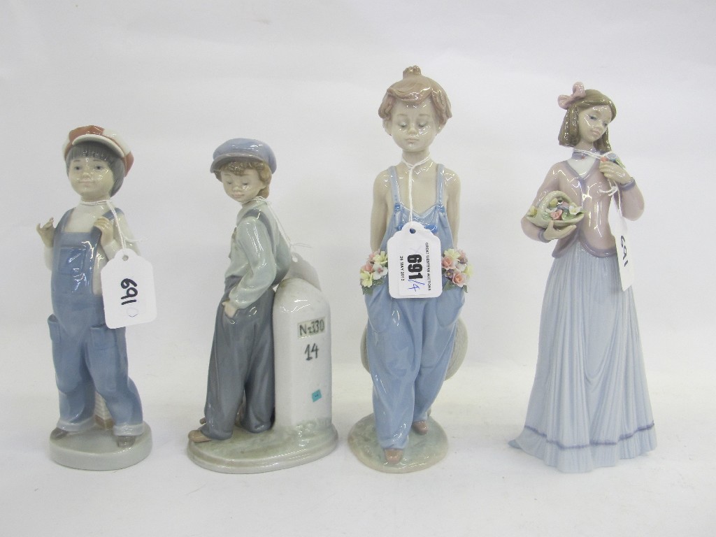 Appraisal: Four Lladro figures including Boy from Madrid and Pocket full