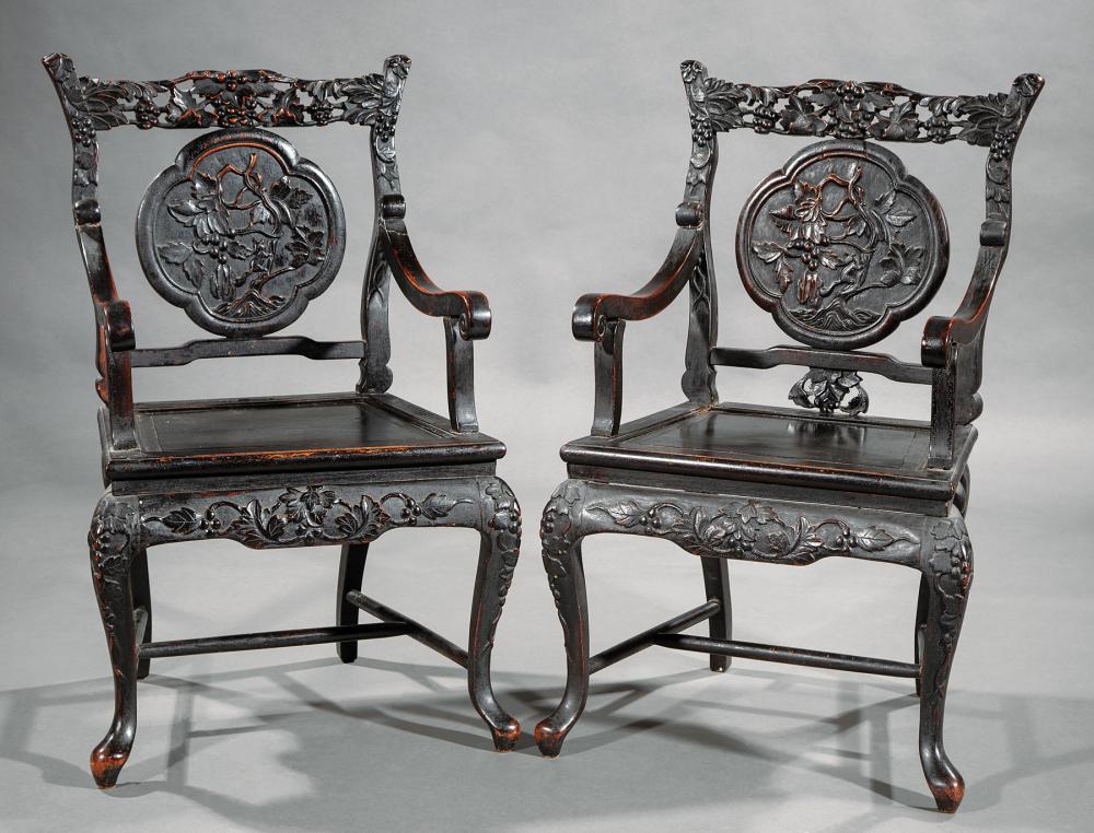 Appraisal: Pair of Chinese Carved and Ebonized Armchairs late th th