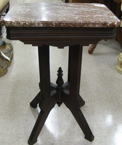 Appraisal: VICTORIAN MARBLE-TOP LAMPSTAND Eastlake design American last quarter of the