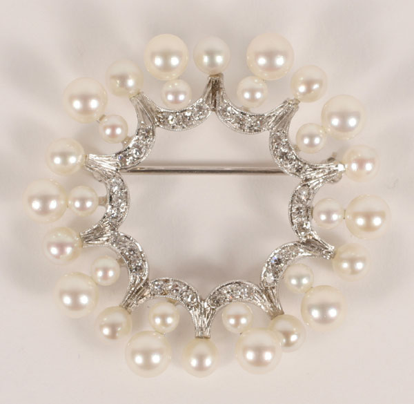 Appraisal: White gold K round brooch fitted with cultured pearls ranging