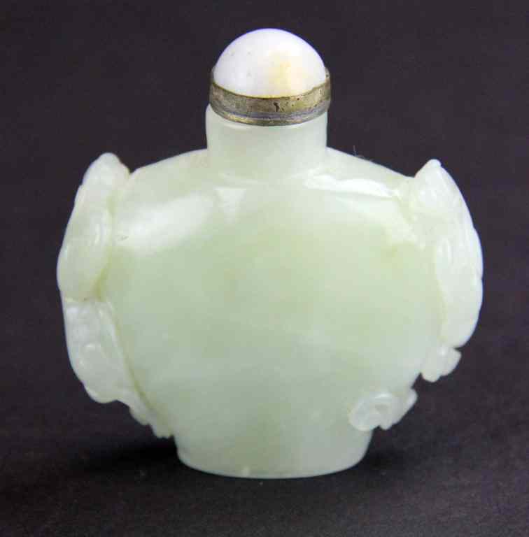 Appraisal: Chinese Carved Celedon Jade Snuff BottleFinely carved to depict two