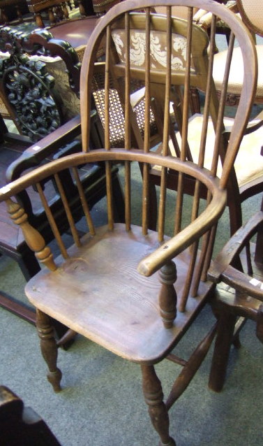 Appraisal: A late th century ash and elm stick back armchair