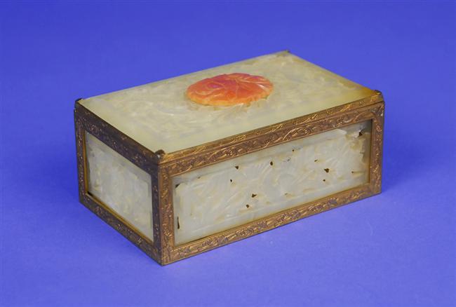 Appraisal: CHINESE CARVED RETICULATED JADE AND BRASS LIFT TOP BOX early