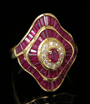 Appraisal: A Retro Ruby and Diamond Dinner Ring An undulated three-tier