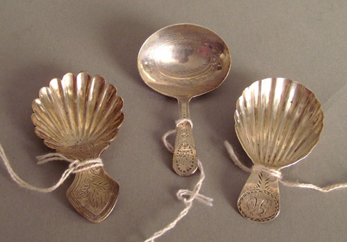 Appraisal: Three Georgian bright cut silver tea caddy spoons and by