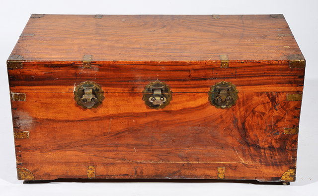 Appraisal: AN OLD BRASS BOUND CAMPHOR WOOD TRUNK with three lock