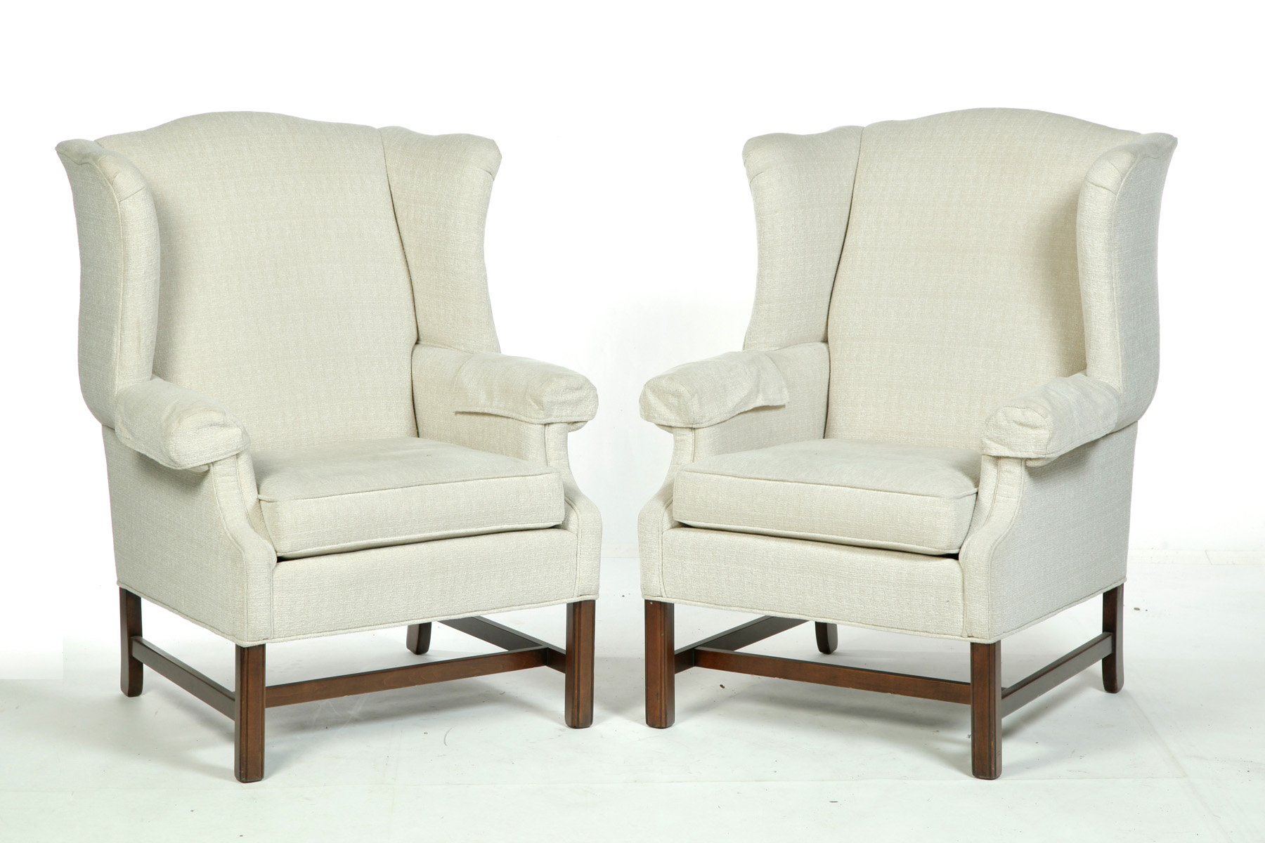 Appraisal: PAIR OF CHIPPENDALE-STYLE EASY CHAIRS Twentieth century mahogany Molded legs