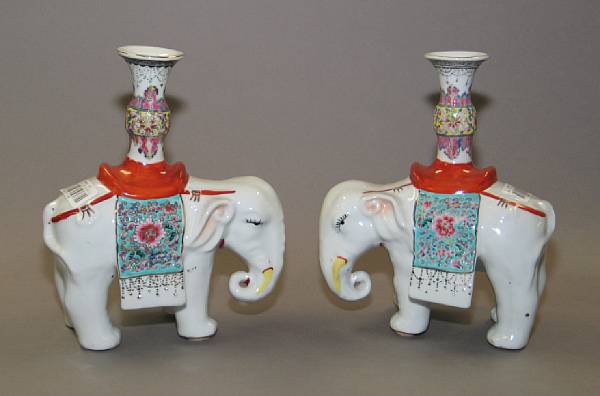 Appraisal: A pair of Chinese style glazed porcelain elephants th Century