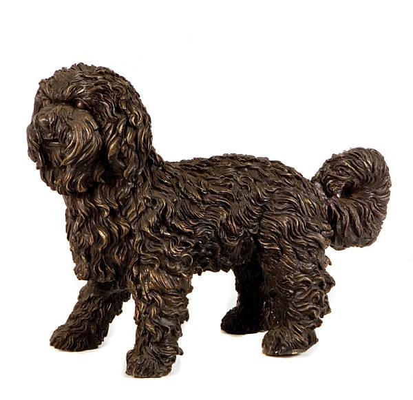 Appraisal: A patinated bronze figure of a dog height in width