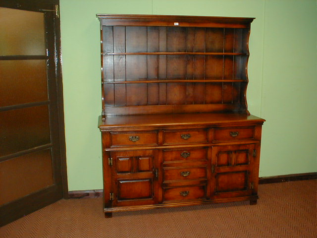 Appraisal: An oak Batheaston Cumper and Lockhart dresser with plate rack