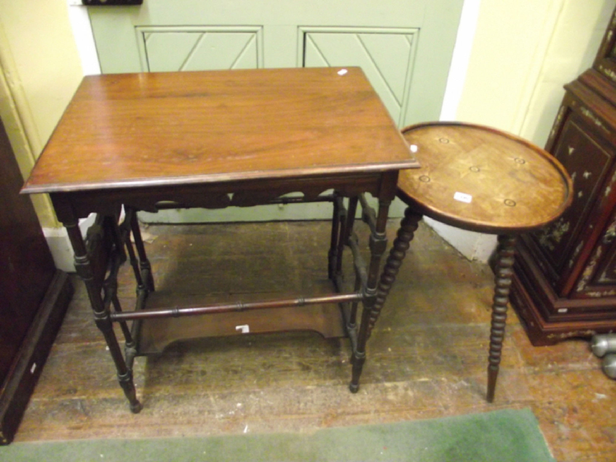 Appraisal: A th century mahogany occasional table the circular tray top