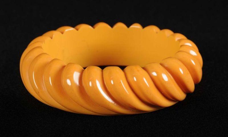 Appraisal: Bakelite Deeply Carved Cream Curvilinear Bracelet Condition Excellent Size -