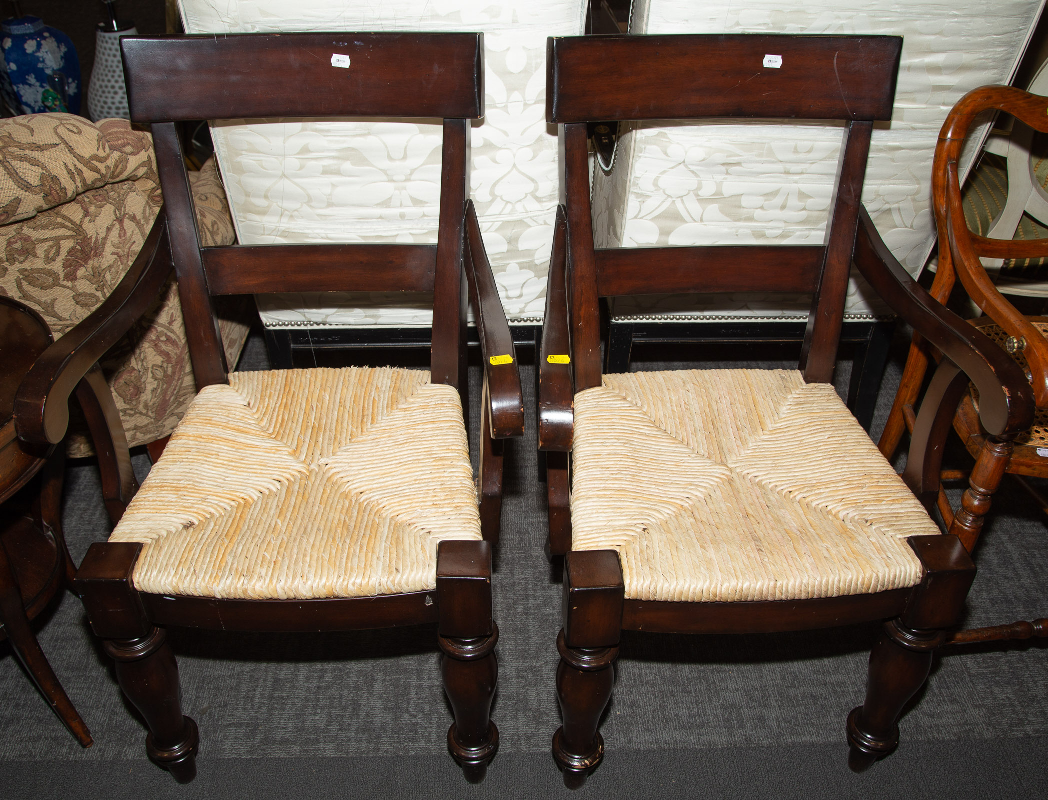 Appraisal: A PAIR OF GREEK REVIVAL STYLE RUSH SEAT ARM CHAIRS