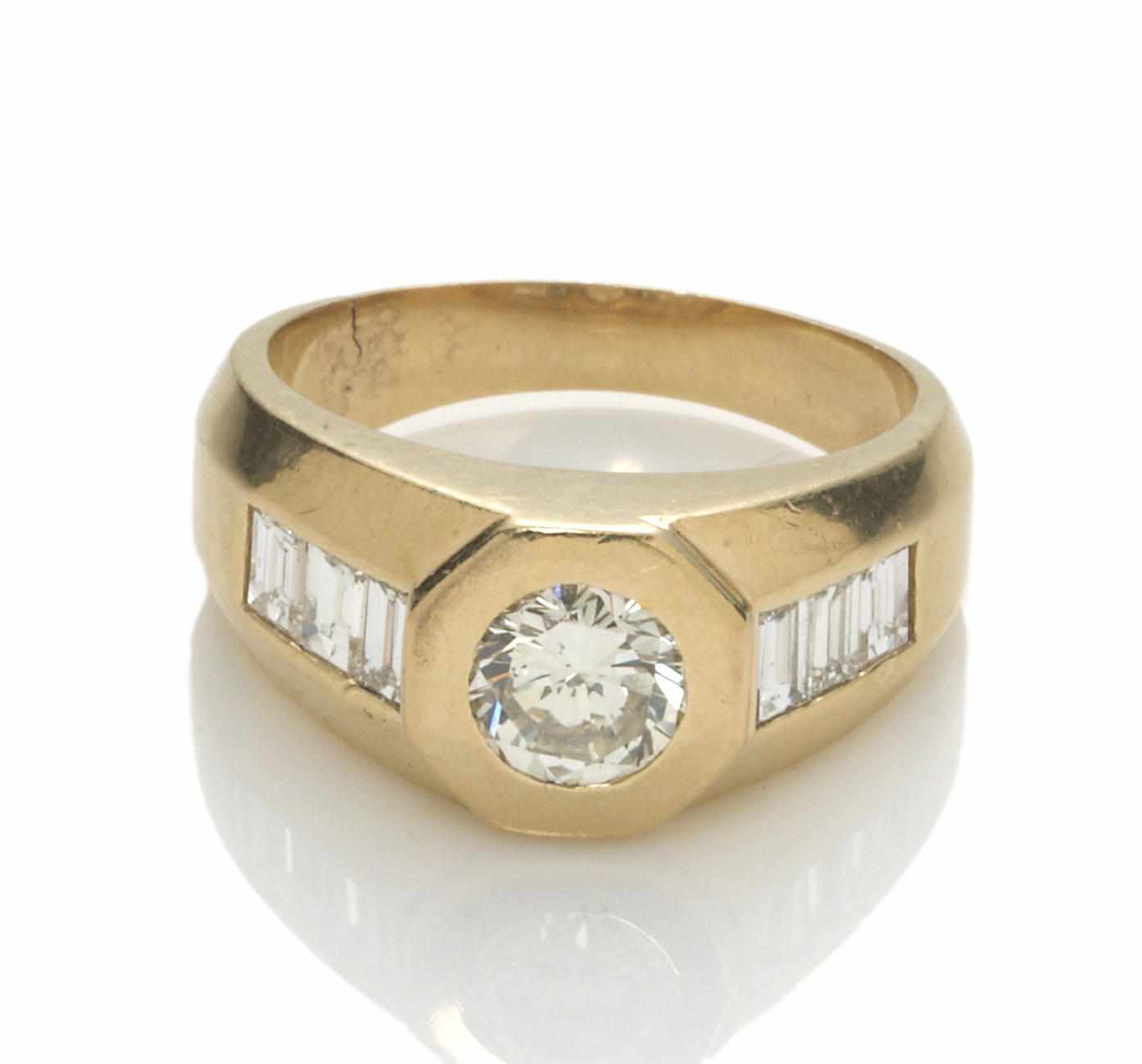 Appraisal: A diamond ring central round brilliant-cut diamond weighing approximately carats