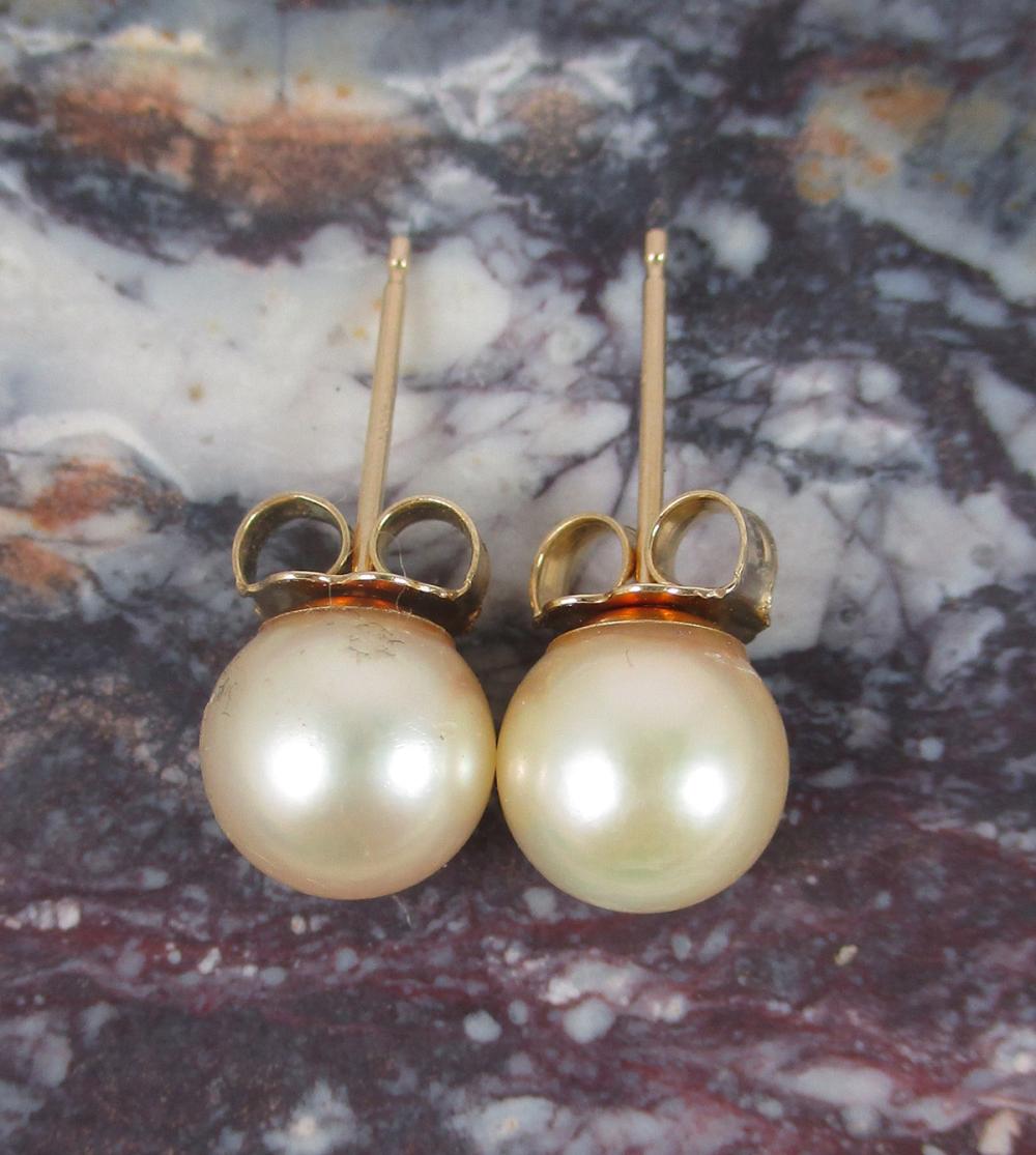 Appraisal: PAIR OF PEARL AND FOURTEEN KARAT GOLD EAR STUDS each